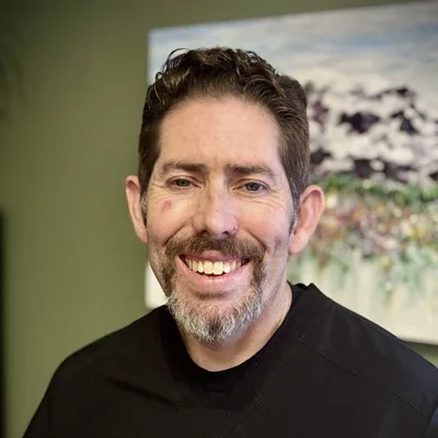 A headshot photo of Dr. Michael Chapman